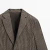 Blazer en lin avec détails de poches Blazer en lin avec détails de poches