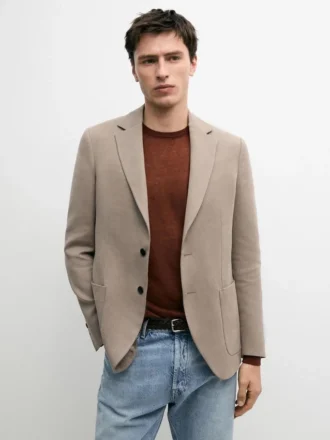 Blazer en lin à la coupe ajustée avec détails de poches