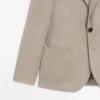 Blazer en lin à la coupe ajustée avec détails de poches Blazer en lin à la coupe ajustée avec détails de poches