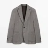 Blazer sur mesure en mélange de lin à motif chevrons Blazer sur mesure en mélange de lin à motif chevrons