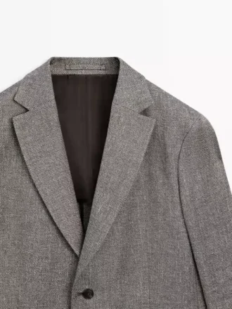 Blazer sur mesure en mélange de lin à motif chevrons