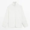 Blouse à col montant avec détail à l’ourlet Blouse à col montant avec détail à l’ourlet
