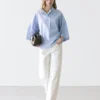 Blouse fluide avec col boutonné Blouse fluide avec col boutonné