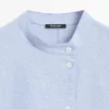 Blouse fluide avec col boutonné Blouse fluide avec col boutonné