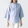 Blouse fluide avec col boutonné Blouse fluide avec col boutonné