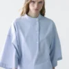 Blouse fluide avec col boutonné Blouse fluide avec col boutonné