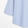 Blouse fluide avec col boutonné Blouse fluide avec col boutonné
