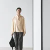 Blouse fluide avec détail plastron Blouse fluide avec détail plastron