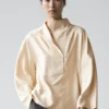 Blouse fluide avec détail plastron Blouse fluide avec détail plastron