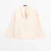Blouse fluide avec détail plastron Blouse fluide avec détail plastron
