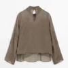 Blouse semi-transparente brodée Blouse semi-transparente brodée