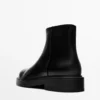 Bottines en cuir avec doublure en daim Bottines en cuir avec doublure en daim