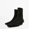 Bottines à talon compensé en cuir refendu