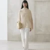 Cape en tricot avec fentes Cape en tricot avec fentes