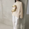 Cape en tricot avec fentes Cape en tricot avec fentes