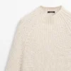 Cape en tricot avec fentes Cape en tricot avec fentes