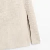 Cape en tricot avec fentes Cape en tricot avec fentes