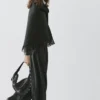 Cape en tricot mélangé laine avec franges Cape en tricot mélangé laine avec franges