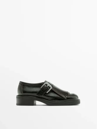 Chaussures derby à boucles et franges