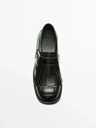 Chaussures derby à boucles et franges