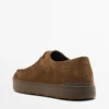Chaussures en cuir à bout mocassin et semelle épaisse Chaussures en cuir à bout mocassin et semelle épaisse