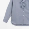 Chemise avec col à volants Chemise avec col à volants