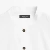 Chemise à col montant avec boutons dorés Chemise à col montant avec boutons dorés