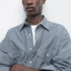 Chemise en denim à coupe classique avec poches