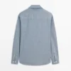 Chemise en denim à coupe classique avec poches