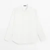 Chemise en popeline avec boutons cachés Chemise en popeline avec boutons cachés
