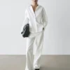 Chemise en popeline de coton avec pinces Chemise en popeline de coton avec pinces