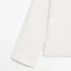 Chemise fluide avec détail sur la poitrine Chemise fluide avec détail sur la poitrine