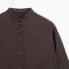 Chemise fluide avec détails boutonnés Chemise fluide avec détails boutonnés