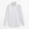 Chemise slim fit en coton avec doubles poignets Chemise slim fit en coton avec doubles poignets