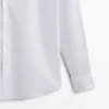 Chemise slim fit en coton avec doubles poignets Chemise slim fit en coton avec doubles poignets