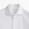 Chemise slim fit en coton avec doubles poignets Chemise slim fit en coton avec doubles poignets