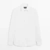 Chemise slim fit en popeline 100 % coton Chemise slim fit en popeline 100 % coton