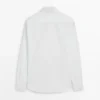 Chemise slim fit en popeline 100 % coton Chemise slim fit en popeline 100 % coton