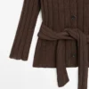 Gilet en maille avec détail à la taille Gilet en maille avec détail à la taille