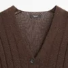 Gilet en maille avec détail à la taille Gilet en maille avec détail à la taille