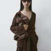 Gilet en maille avec détail à la taille Gilet en maille avec détail à la taille