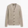 Gilet en tricot de coton avec boutons Gilet en tricot de coton avec boutons