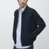 Gilets 100 % coton tricotés avec cols Polos Gilets 100 % coton tricotés avec cols Polos