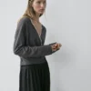 Gilets croisés en maille avec détails en dentelle Gilets croisés en maille avec détails en dentelle
