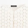 Gilets en coton au crochet avec détails floraux Gilets en coton au crochet avec détails floraux