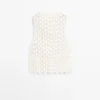 Gilets en coton au crochet avec détails floraux Gilets en coton au crochet avec détails floraux