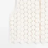 Gilets en coton au crochet avec détails floraux Gilets en coton au crochet avec détails floraux