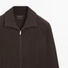 Gilets en coton à mailles torsadées avec fermeture éclair Gilets en coton à mailles torsadées avec fermeture éclair