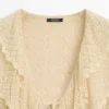 Gilets en mélange de lin avec détails à volants Gilets en mélange de lin avec détails à volants