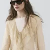 Gilets en mélange de lin avec détails à volants Gilets en mélange de lin avec détails à volants